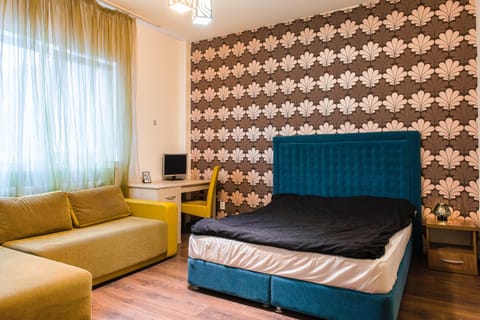 Property building, Bed, Seating area, Bedroom