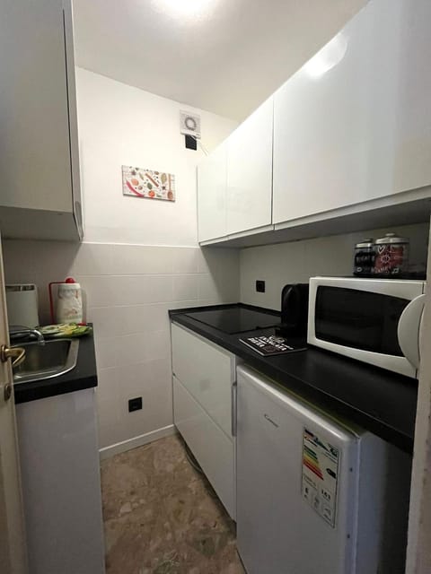Kitchen or kitchenette, stove, toaster, kitchen