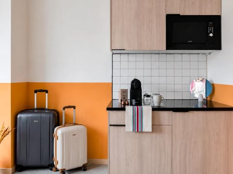 Kitchen or kitchenette, microwave, stove, kitchen