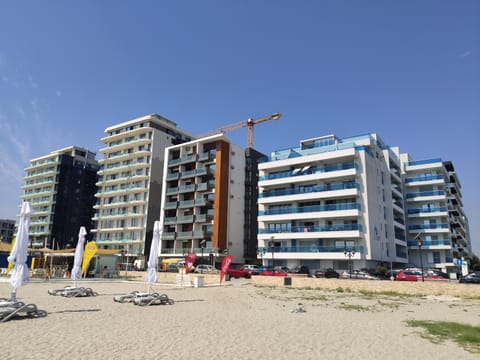 Property building, Nearby landmark, Neighbourhood, Beach