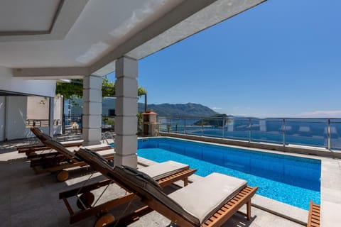 Mountain view, Pool view, Sea view, Swimming pool, sunbed