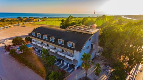 Property building, Nearby landmark, Day, Neighbourhood, Natural landscape, Bird's eye view, Beach, Sea view, Sunrise, Sunset