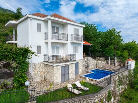 Property building, Patio, Spring, Day, Natural landscape, Pool view, Swimming pool, sunbed