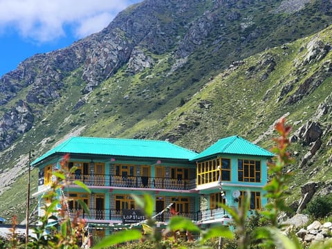 Property building, Natural landscape, Mountain view