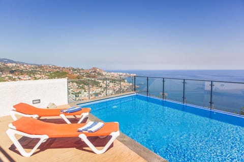 View (from property/room), Decorative detail, City view, Landmark view, Mountain view, Pool view, Sea view, Swimming pool