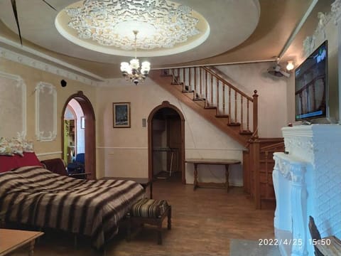 Bed, TV and multimedia, Living room, Seating area