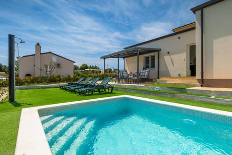 Property building, Pool view, Swimming pool, sunbed