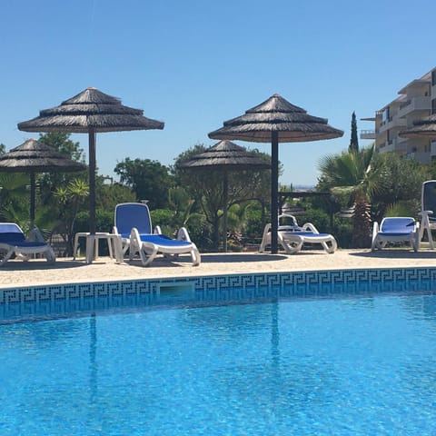 Swimming pool, sunbed