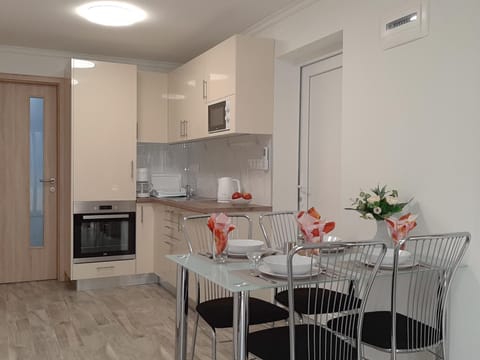 Kitchen or kitchenette, oven, stove