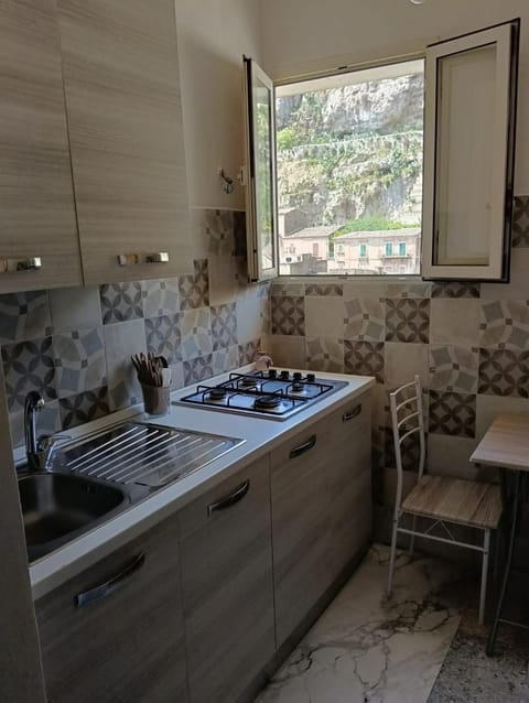 Kitchen or kitchenette, stove