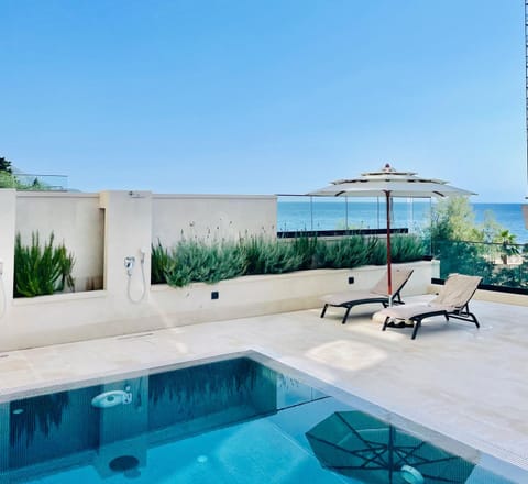 Patio, Day, Natural landscape, View (from property/room), Pool view, Sea view, Swimming pool, sunbed