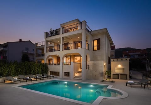 Property building, Swimming pool, Sunset