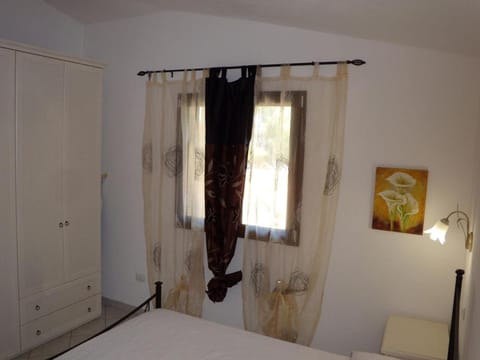 1CASADELFARO con Giardino a Pittulongu 600Metri dalla Spiaggia House in Pittulongu