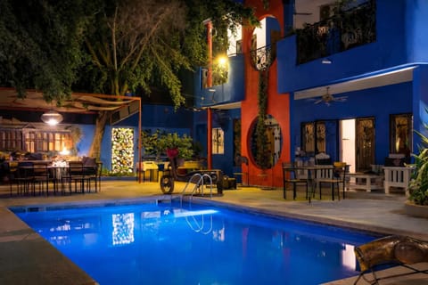 Property building, Patio, Night, Pool view, Swimming pool