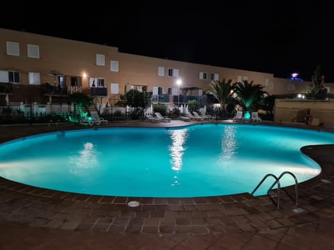 Property building, Night, Pool view, Swimming pool