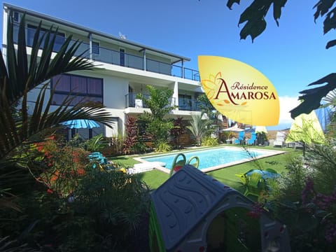 Property building, Day, Property logo or sign, Garden, Garden view, Pool view, Swimming pool, sunbed