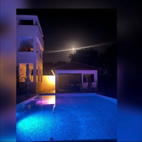 Property building, Night, Pool view, Swimming pool