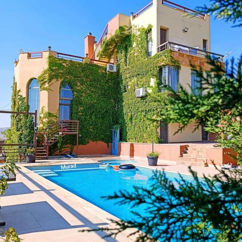 Property building, Spring, Pool view, Swimming pool, sunbed