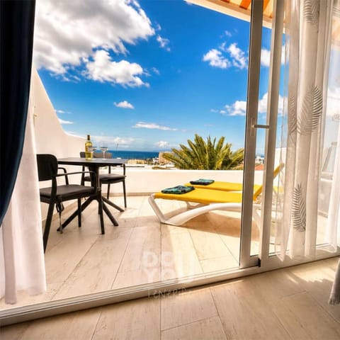 Patio, Day, View (from property/room), Balcony/Terrace, Living room, Seating area, Sea view, sunbed