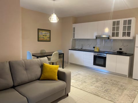 Kitchen or kitchenette, Living room, Seating area, Dining area