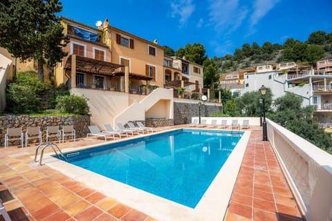 Property building, Living room, Swimming pool