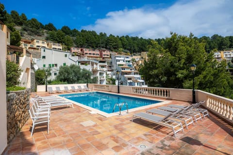Property building, Living room, Swimming pool