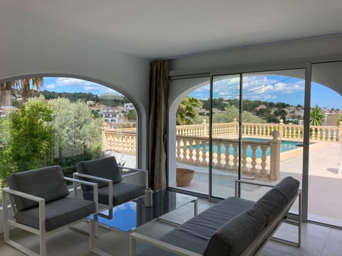 Natural landscape, View (from property/room), Living room, Pool view