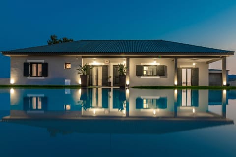 Property building, Facade/entrance, Swimming pool, Sunset