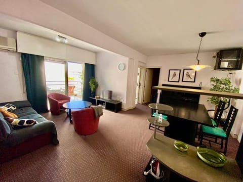 TV and multimedia, Living room, Photo of the whole room, Seating area, Dining area