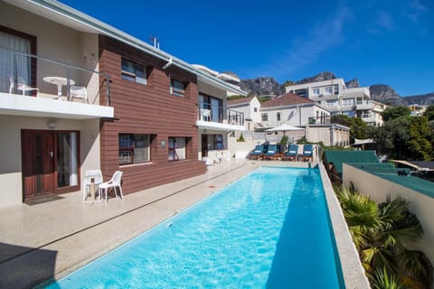 Property building, Day, Neighbourhood, Natural landscape, Mountain view, Pool view, Street view, Swimming pool, Swimming pool, sunbed