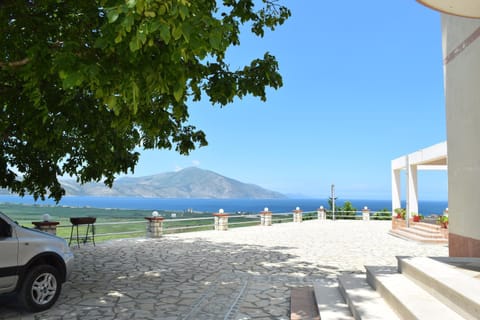 Nearby landmark, Day, Neighbourhood, Natural landscape, Beach, Mountain view, Sea view, Parking