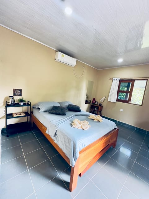 Bed, Photo of the whole room, Bedroom, towels, air conditioner