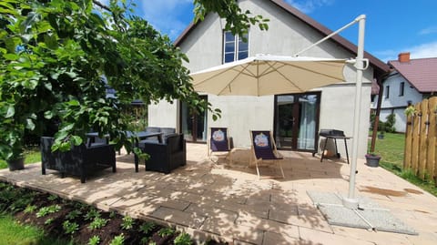 Property building, Patio, Garden, Seating area, Garden view