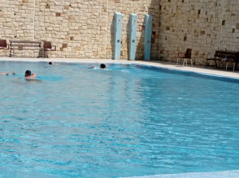 Swimming pool, sunbed