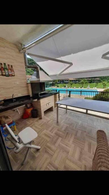 Patio, BBQ facilities, Pool view