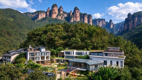 Property building, Nearby landmark, Spring, Natural landscape, Mountain view