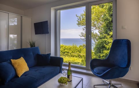 Natural landscape, TV and multimedia, View (from property/room), Living room, Seating area, Sea view, Sea view, Location, hair dryier, wardrobe, dryer