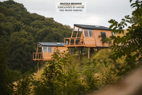 Property building, Day, Natural landscape, Text overlay, Mountain view