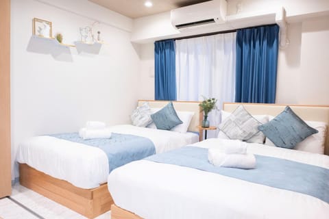 Bed, Photo of the whole room, Bedroom, towels, air conditioner