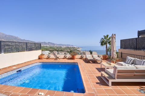 Property building, Living room, Swimming pool