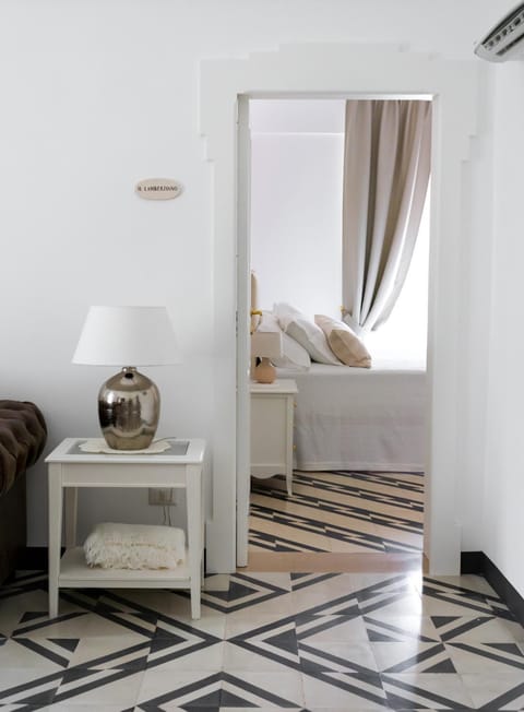 Communal lounge/ TV room, Bed, Living room, Photo of the whole room, Decorative detail, Seating area, Bedroom, air conditioner