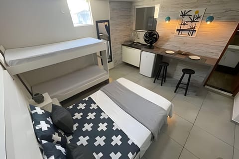 Central Praias Suíte 204 com ar, tv, frigobar, banheiro privativo, ampla, decorada, centro comercial Apartment in Cabo Frio