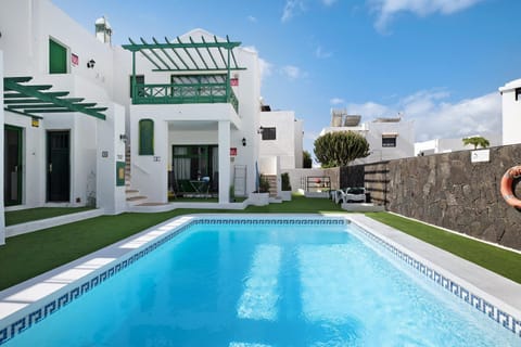 Property building, Living room, Swimming pool