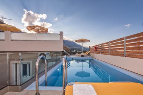 Property building, Pool view, Swimming pool, Sunrise