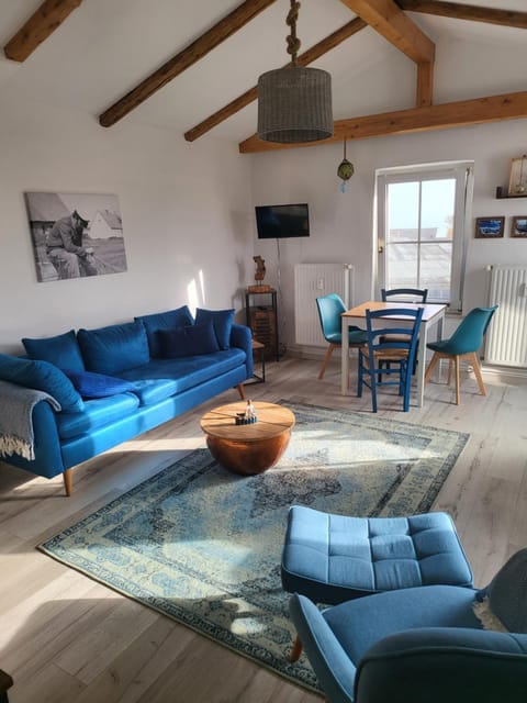 Living room, Living room, Seating area, Dining area, Sea view