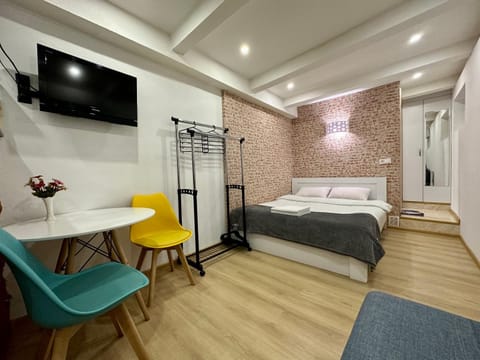 Communal lounge/ TV room, Bed, Living room, Seating area, hair dresser