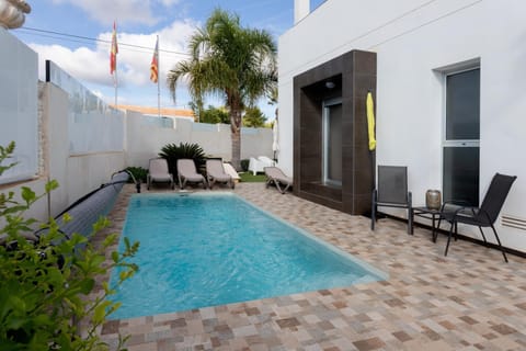 Property building, Living room, Swimming pool