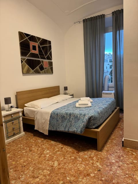 Bed, Photo of the whole room, Bedroom, towels, air conditioner