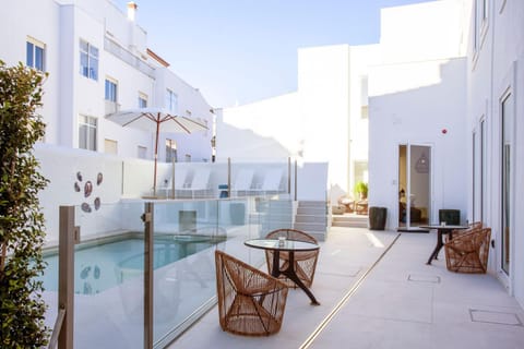 Property building, Patio, Day, Balcony/Terrace, Pool view, Swimming pool, pet friendly, sunbed
