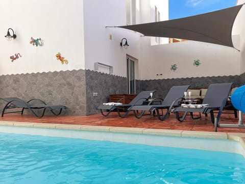 Property building, Living room, Swimming pool